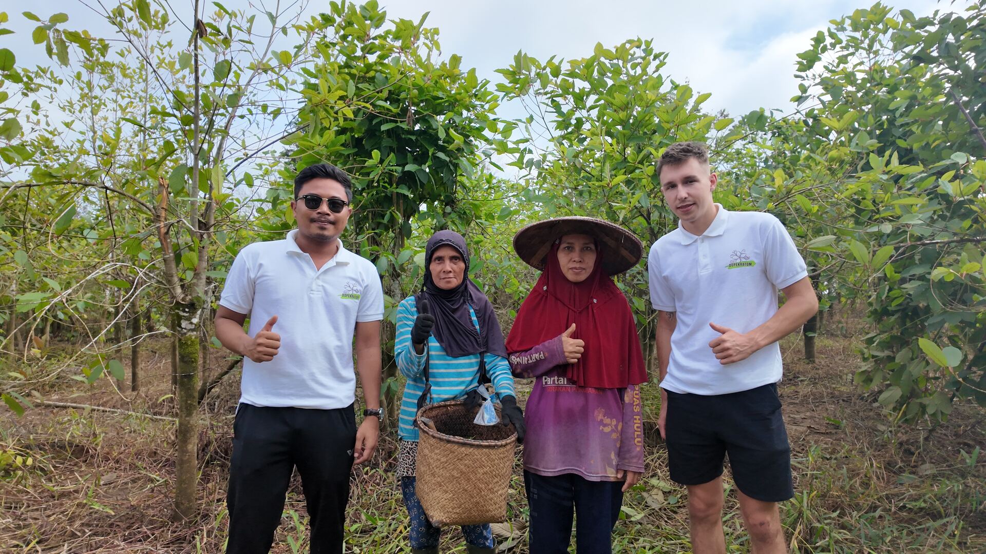 With local farmers in the plantation